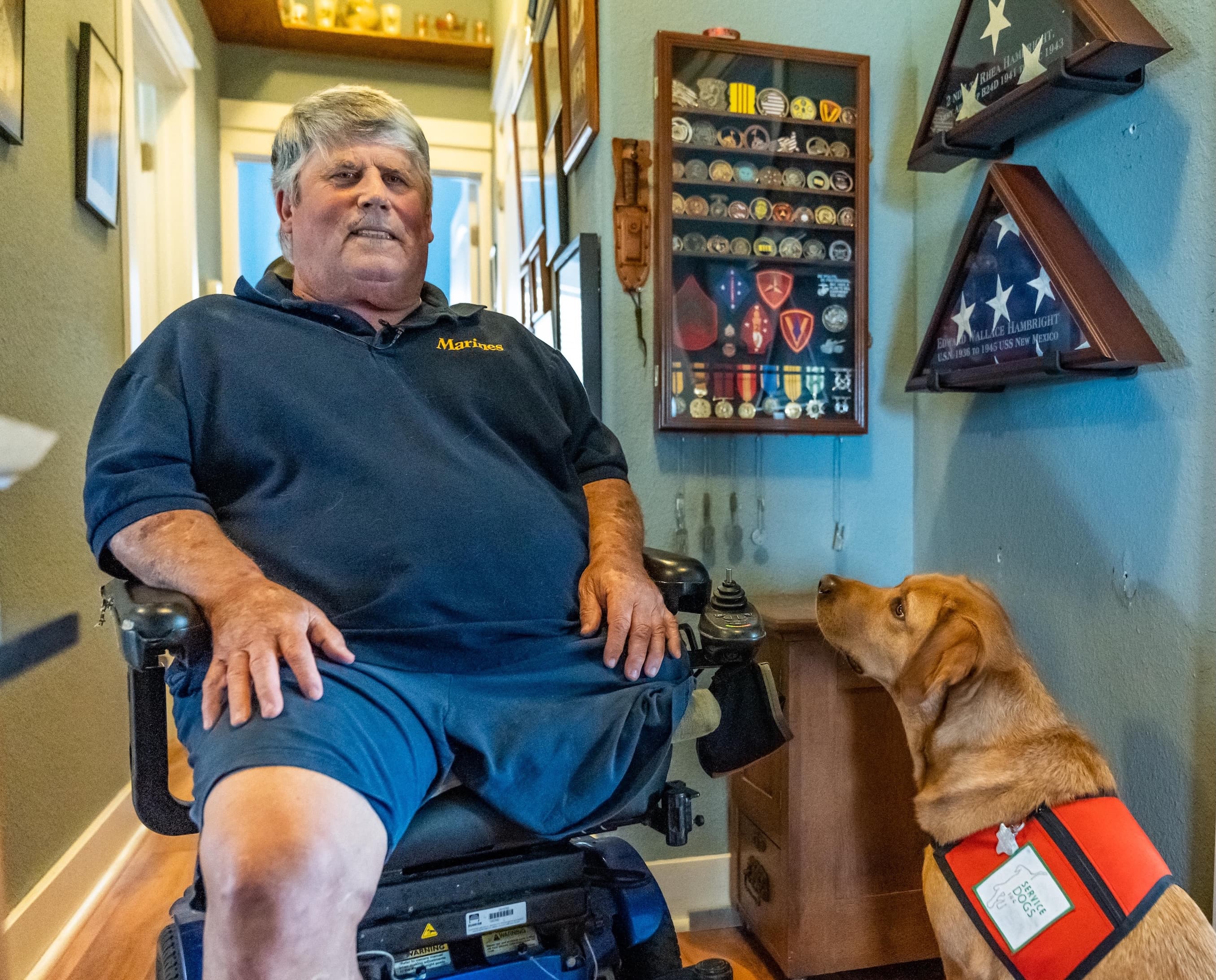 U.S. Marine Rhea Hambright with his service dog Beatrice